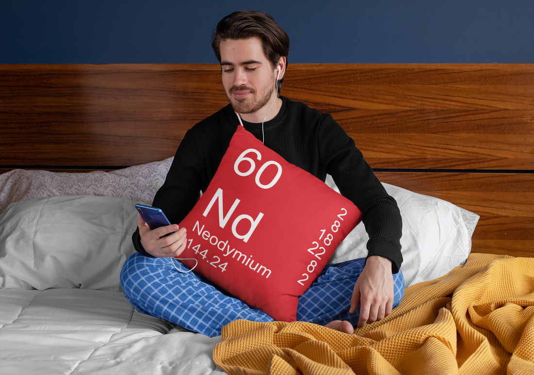 Red Neodymium Element Pillow in Man's Lap