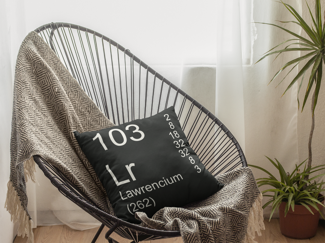 Black Lawrencium Element Pillow in Chair