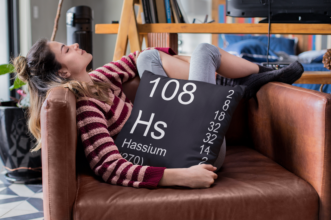 Black Hassium Element Pillow on Chair with Girl