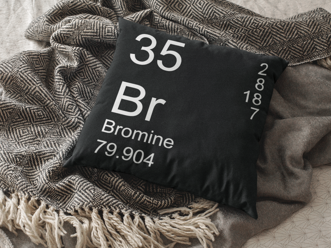 Black Bromine Element Pillow on Blanket