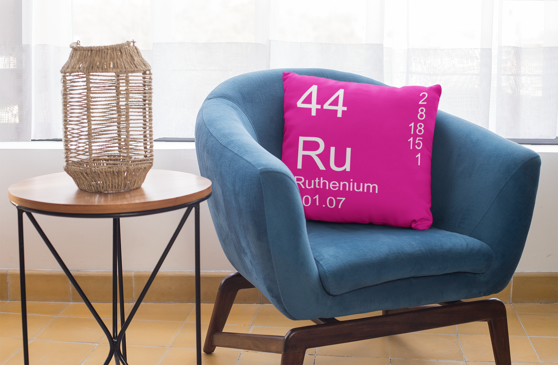 Pink Ruthenium Element Pillow on Blue Chair