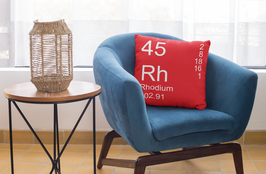Red Rhodium Element Pillow on Blue Chair