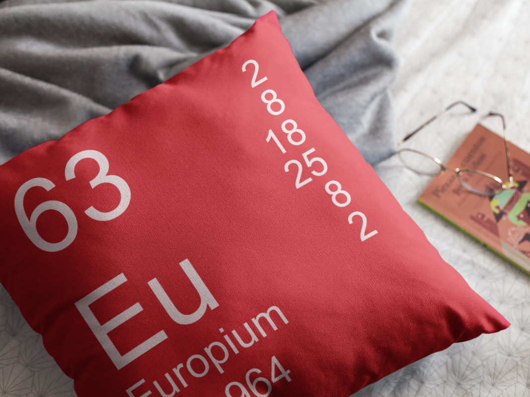 Red Europium Element Pillow on Bed