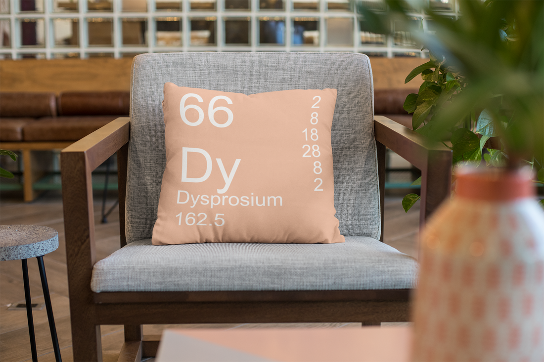 The Periodic table of elements pillow  - Peach Dysprosium Element Pillow on Chair