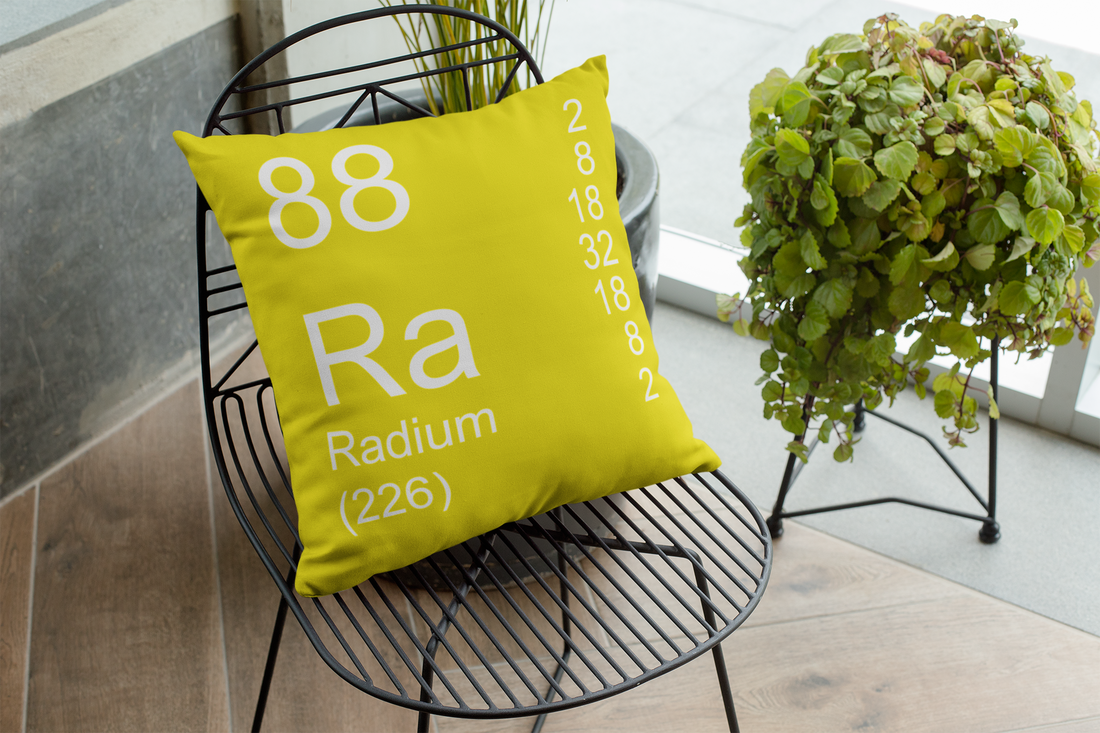 Yellow Radium Element Pillow on Black Chair