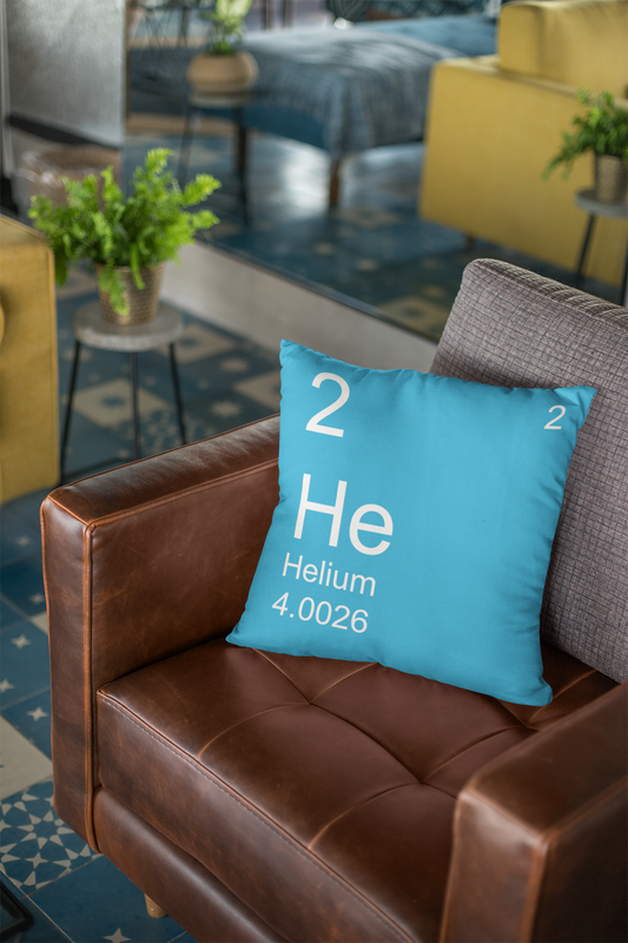 Blue Helium Element Pillow on Leather Chair