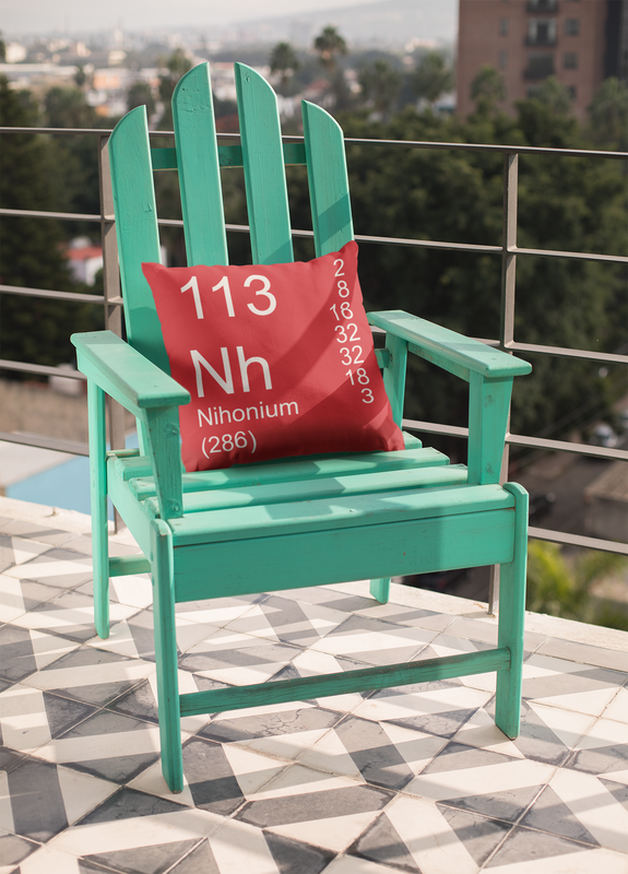 Red Nihonium Element Pillow on Outdoor Chair