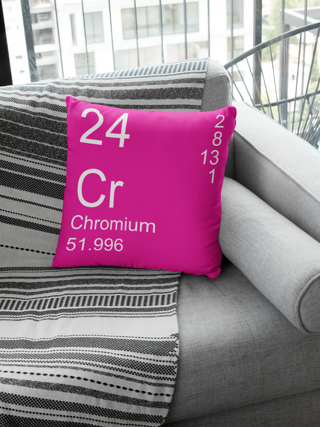 Pink Chromium Element Pillow on Gray Couch