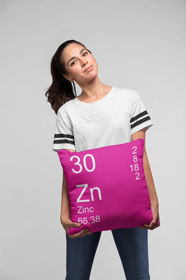 Pink Zinc Element Pillow Held by Woman