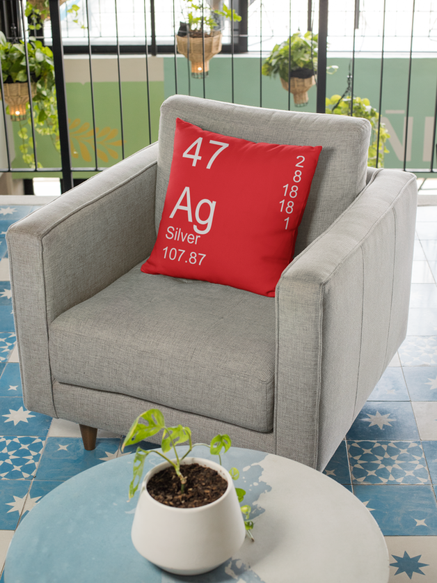 Red Silver Element Pillow on Chair