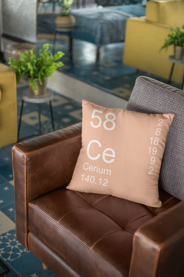 Peach Cerium Element Pillow on Leather Chair