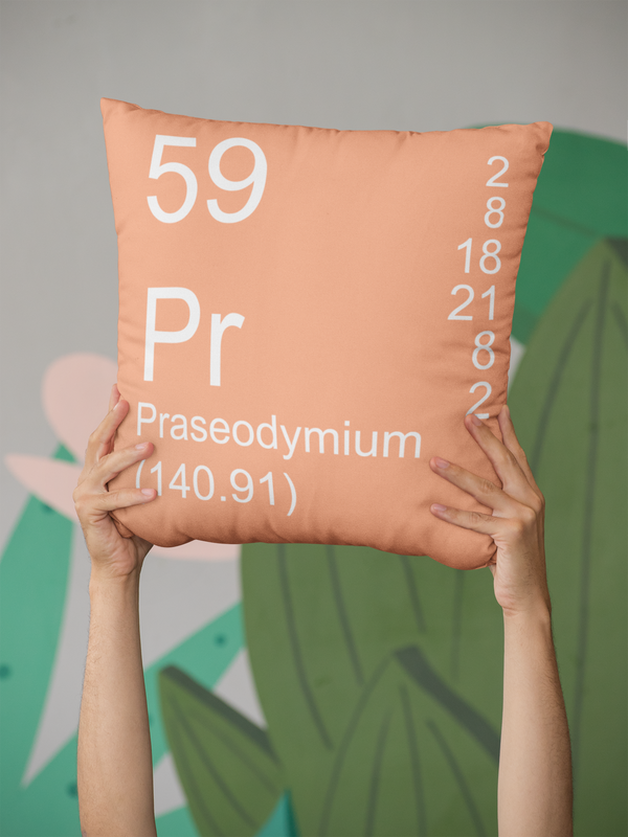 Peach Praseodymium Element Pillow in Hands
