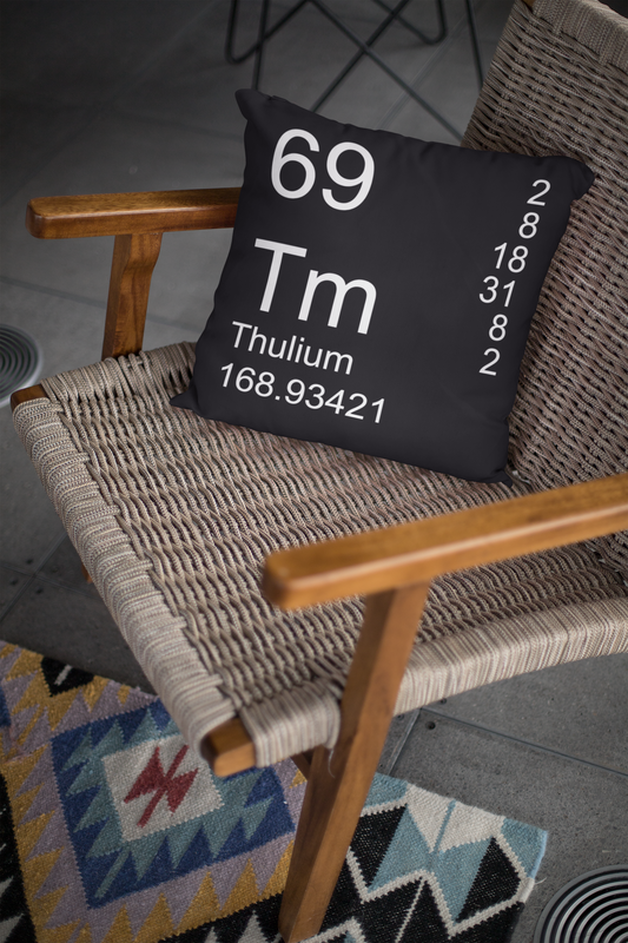Black Thulium Element Pillow on Chair