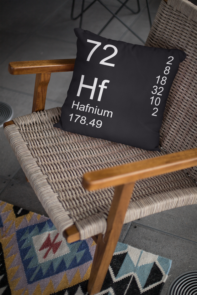 Black Hafnium Element Pillow on Chair