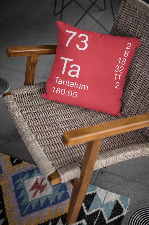 Red Tantalum Element Pillow on Chair