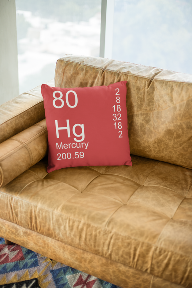 Red Mercury Element Pillow on Leather Couch