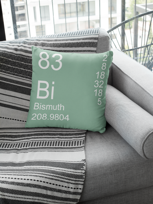 Sage Green Bismuth Element Pillow on Gray Couch