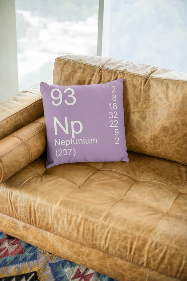 Lilac Neptunium Element Pillow on Leather Couch