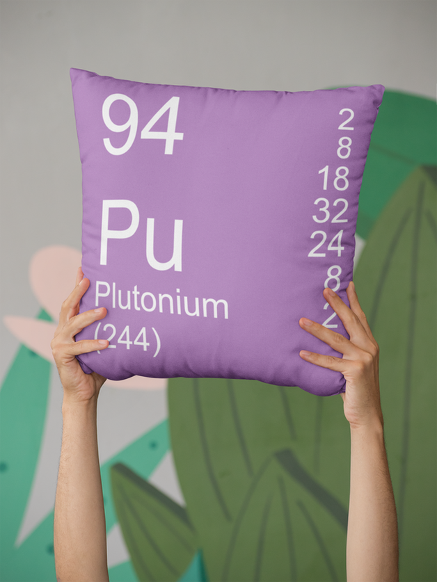 Lilac Plutonium Element Pillow Held in Hands