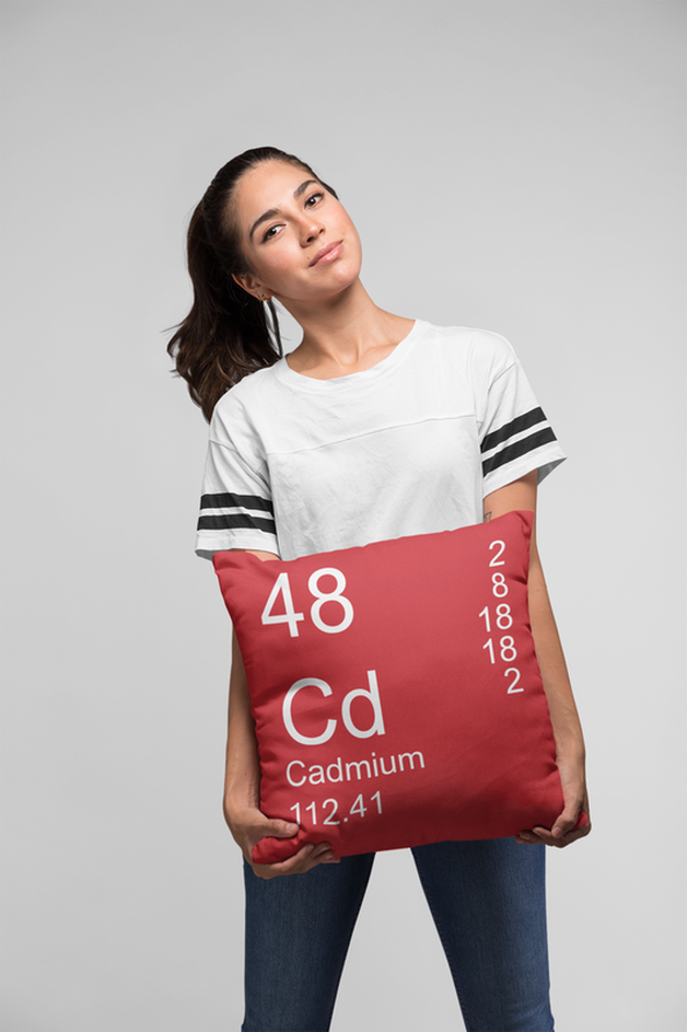 Red Cadmium Element Pillow Held by Woman