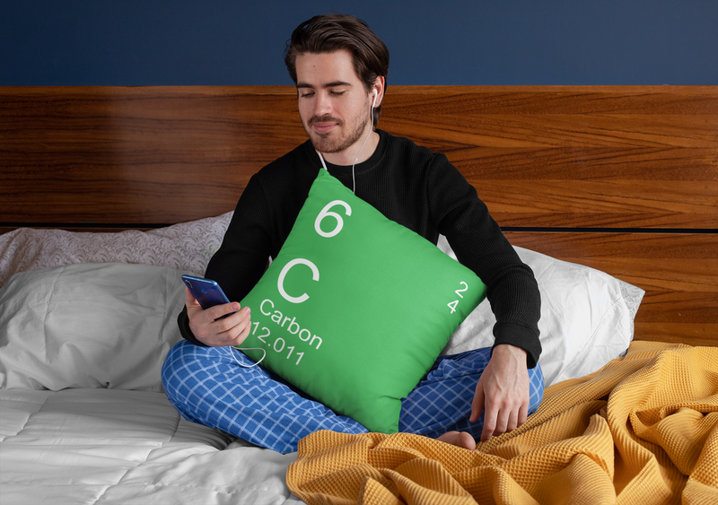 Green Carbon Pillow in Man's Lap