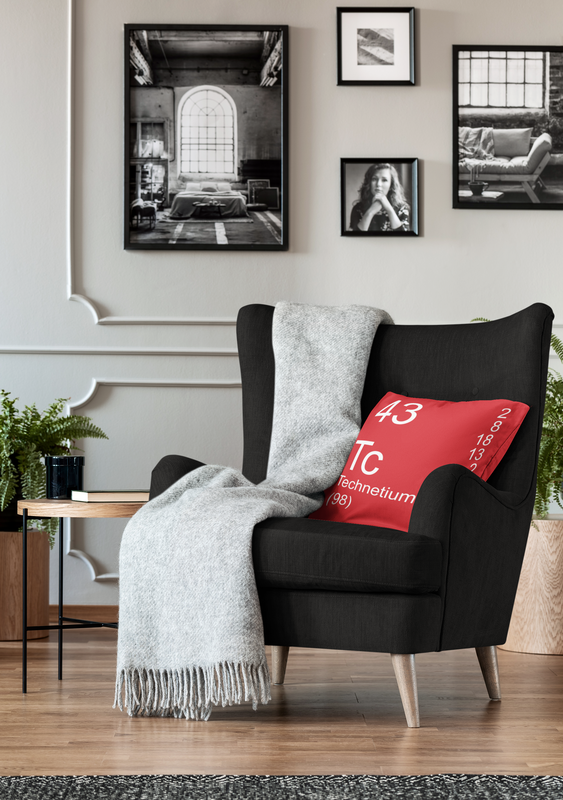 Red Technetium Element Pillow on Couch